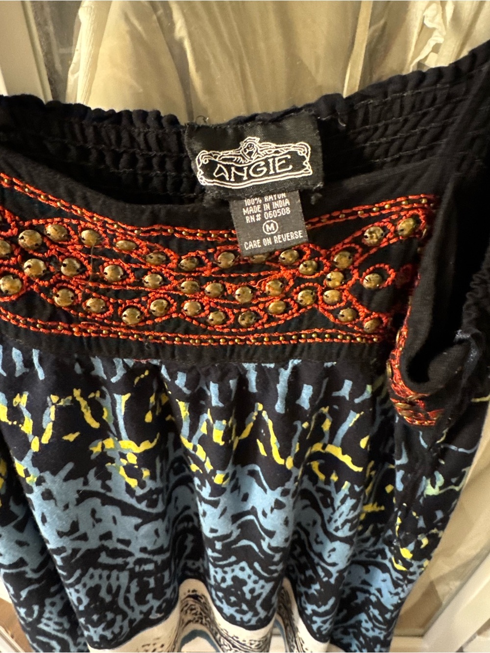 Angie Black Maxi Skirt with Red Embroidered Waistband and Blue-Yellow Print